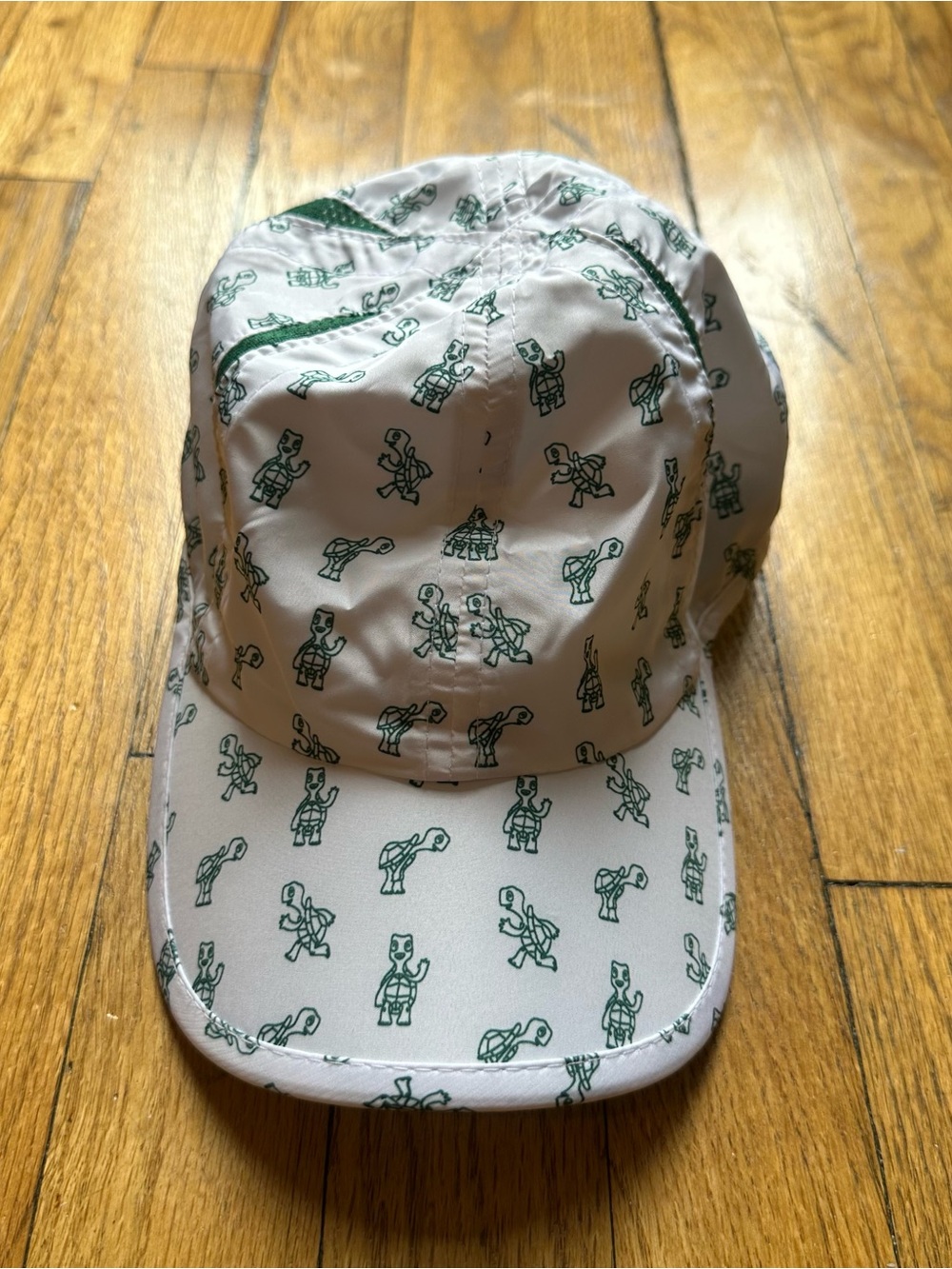 Kids White Cap with Green Character Print